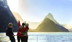 Milford Sound Cruise with guests on small group tour watching mitre peak